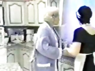 Old Woman And Maid In Kitchen